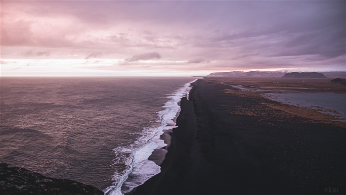 Black Sand Beach with Ocean Waves and Mountains 4K