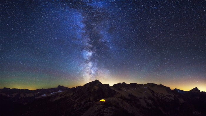 Milky Way over North Cascades mountains with tent