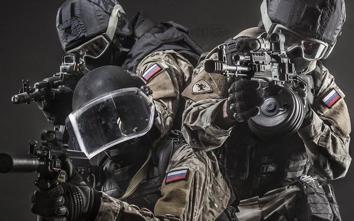 Special forces soldiers with weapons