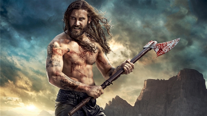 Rollo from Vikings holding bloody axe