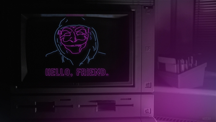 Anonymous mask and "Hello, Friend." on computer screen