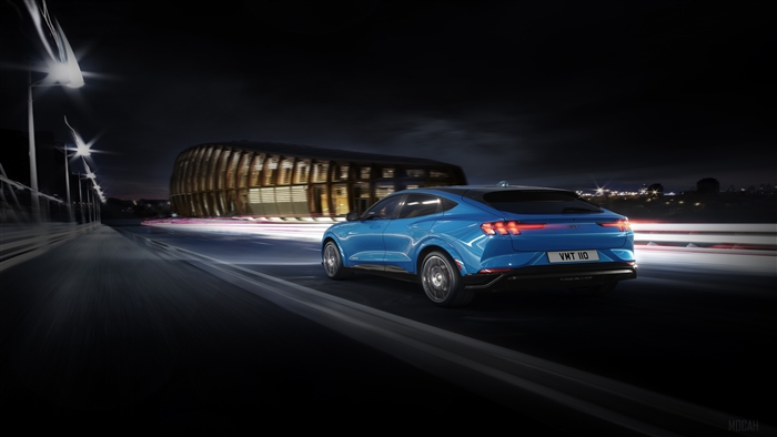 Blue Ford Mustang Mach-E GT Performance Edition driving at night