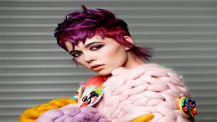 Model with cerise pink hair and avant-garde clothing 4K