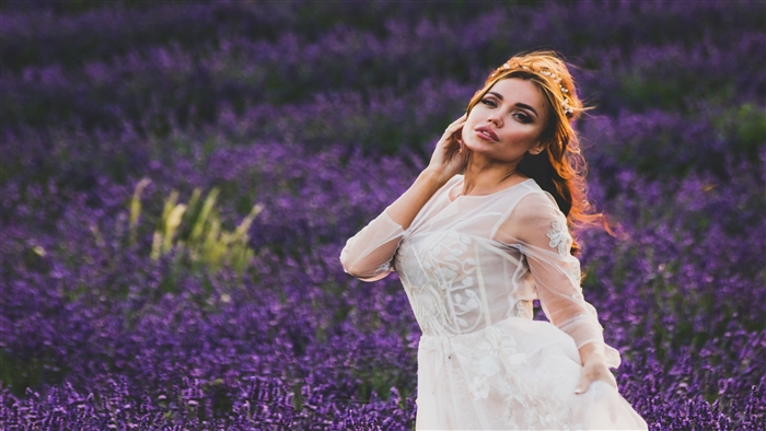 Woman in white dress in lavender field 4K