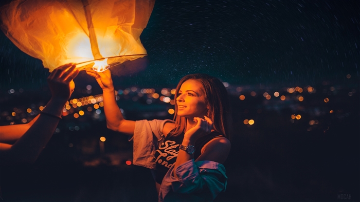 Girl Holding Paper Lantern at Night