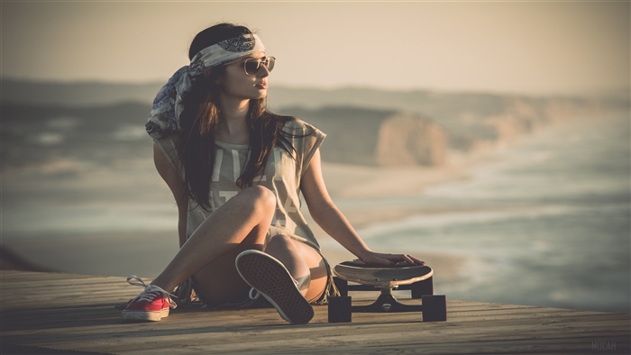 Girl with Skateboard on Wooden Deck