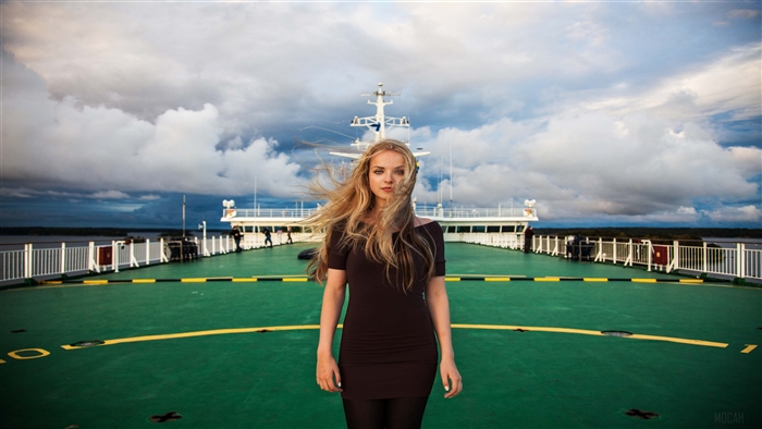 Girl on the deck of a ship
