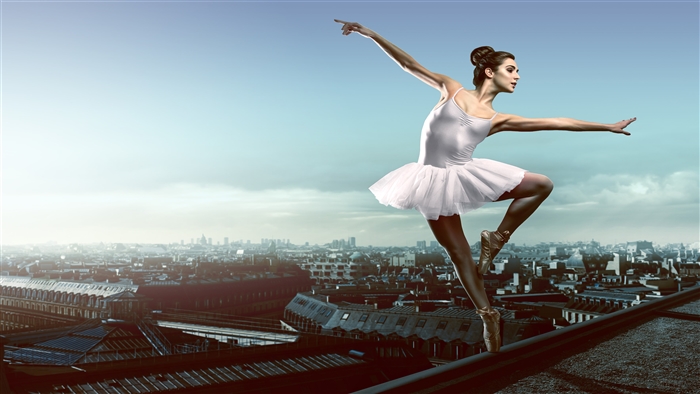 Ballerina performing on a rooftop in Paris