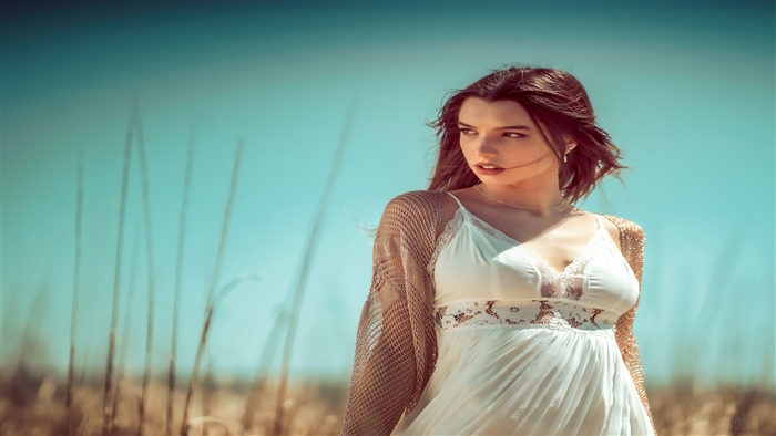 Woman in white dress outdoors 4K