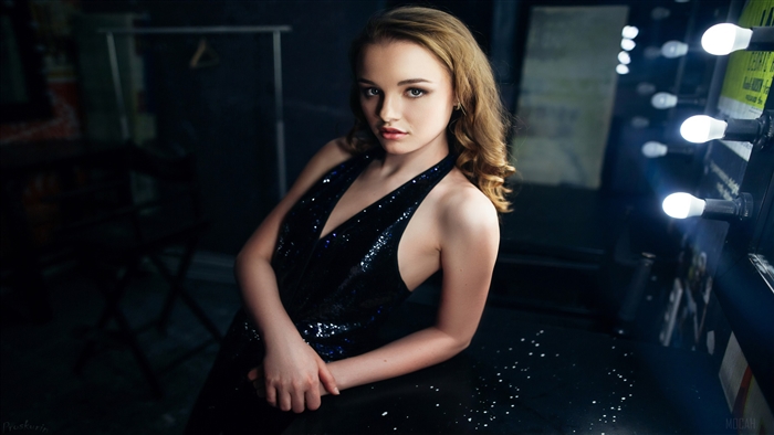 Julia Tavrina in a black sequined dress