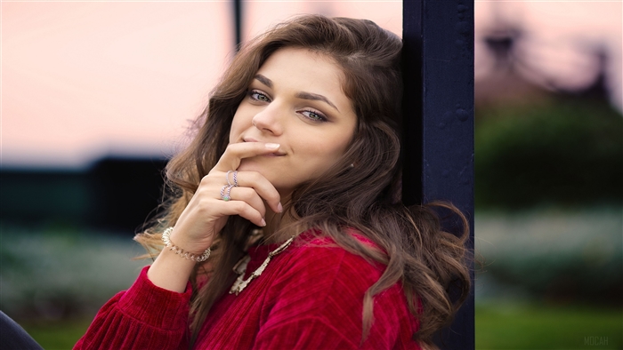 Cute Girl with Brown Hair and Fingers on Lips 4K