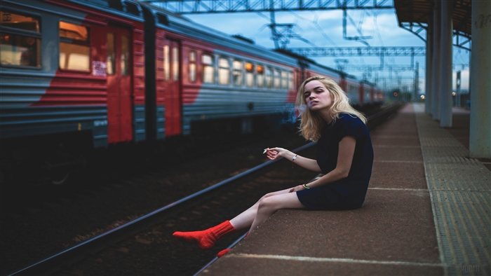 Girl Smoking on Train Platform 4k