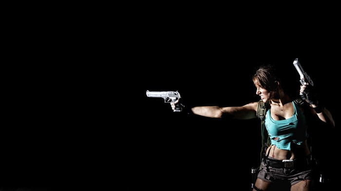 Lara Croft from Tomb Raider holding pistols