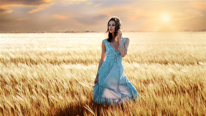 Girl in Blue Dress in Wheat Field at Sunset 4K