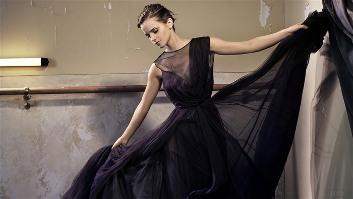 Emma Watson in a dark flowing dress