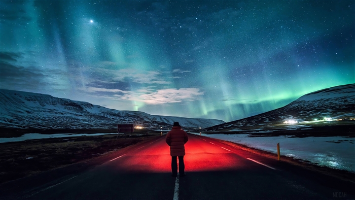 Man Standing on Road Under Aurora Borealis 4K