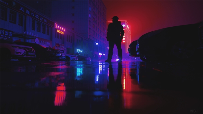 Man standing on wet road with neon lights 4K