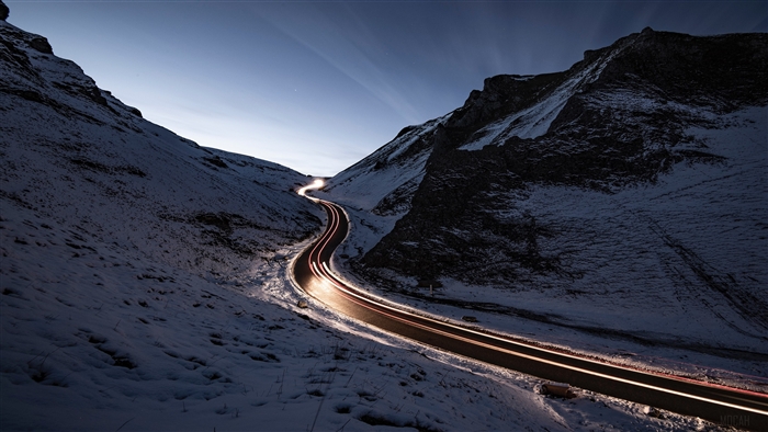 Snowy Mountain Road with Light Trails 4K