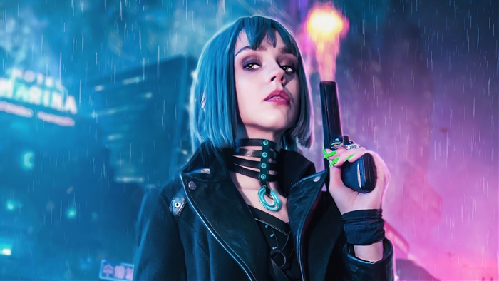 Woman with blue hair holding a gun in the rain