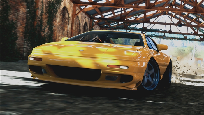 Yellow Lotus Esprit driving on dirt road