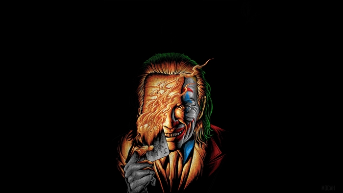 Joker holding a playing card