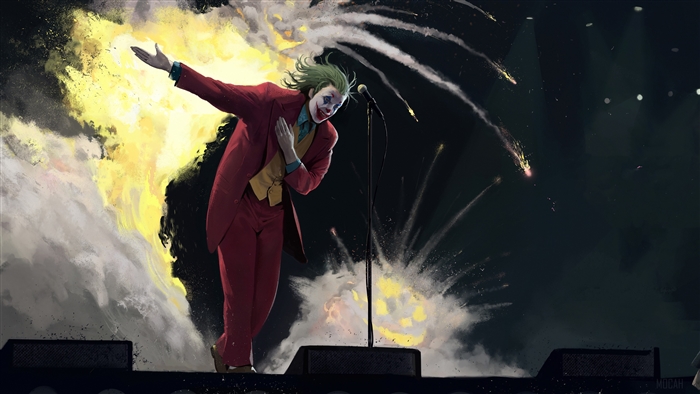 Joker from Batman performing on stage with explosions