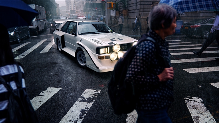 White Audi Quattro on a Rainy City Street 4K