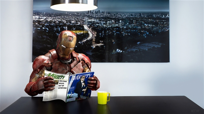 Iron Man reading Variety magazine