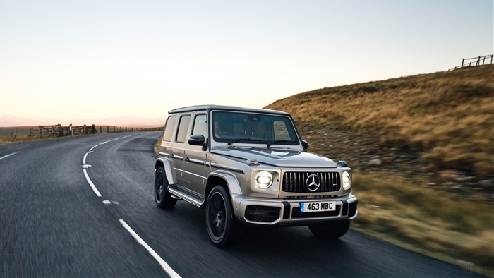 Mercedes-Benz G Wagon driving on a road