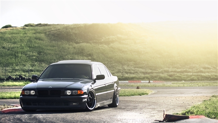 Black BMW E38 Lowrider on a Racetrack 4K