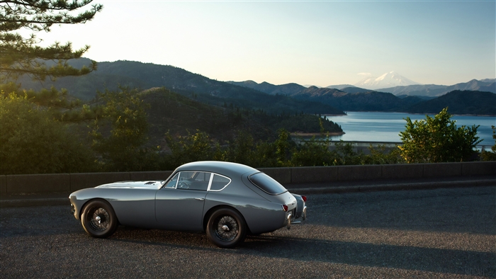 Vintage car on a scenic mountain road
