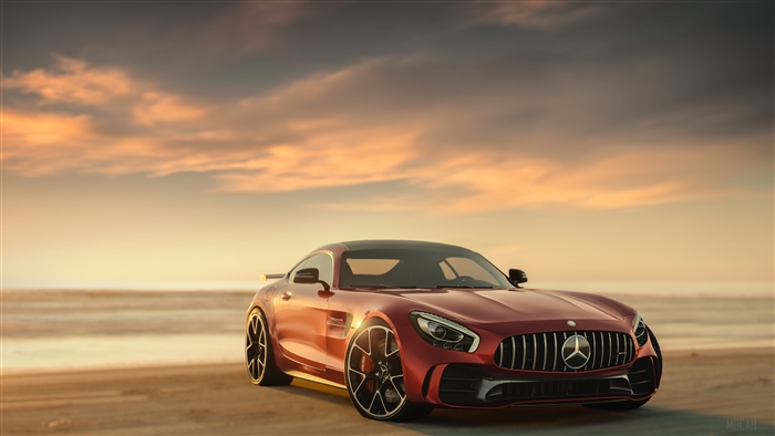 Red Mercedes Benz AMG GT on a beach at sunset