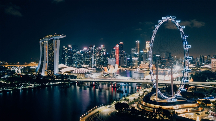 Singapore skyline with Marina Bay Sands and Singapore Flyer at night 4K