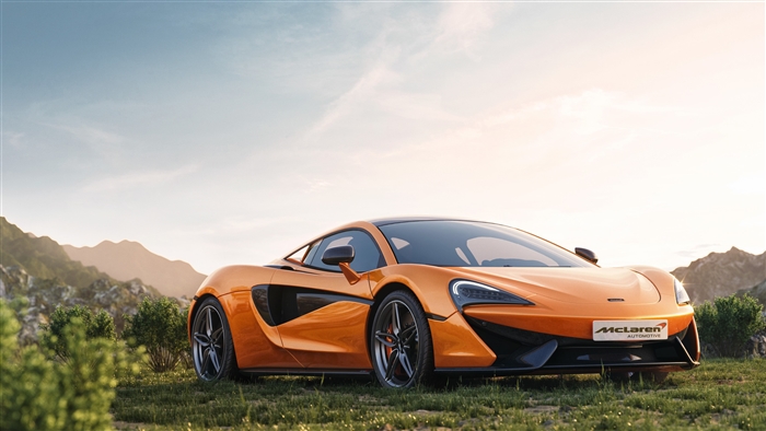 Orange McLaren Automotive car in a landscape 4K
