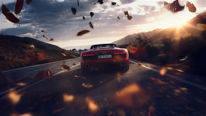 Red Audi R8 V10 driving on a road at sunset