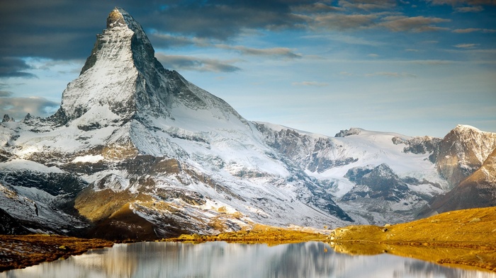 The Matterhorn mountain reflected in a lake