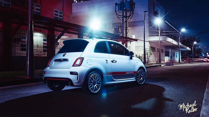 White Fiat 500 Abarth Rear View at Night