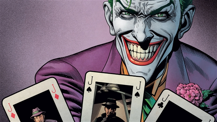 The Joker holding playing cards