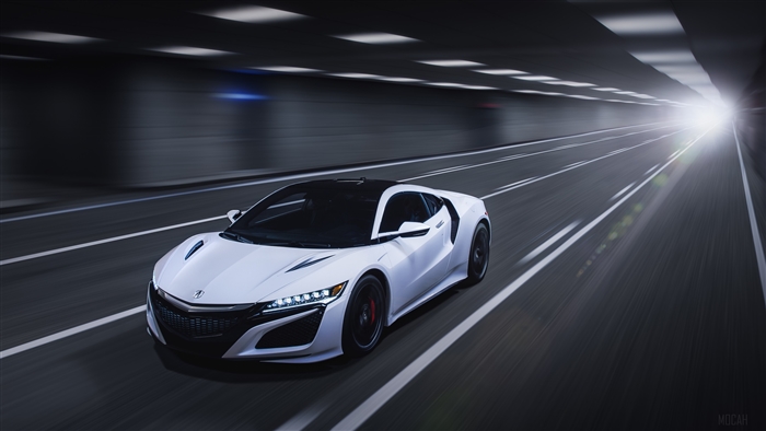 White 2019 Acura NSX driving in a tunnel