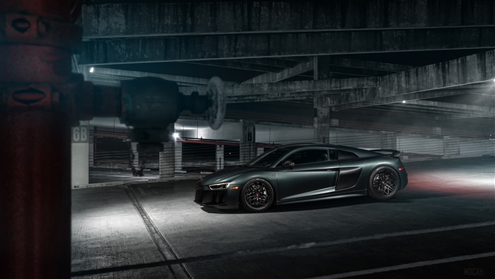 Green Audi R8 parked in a garage