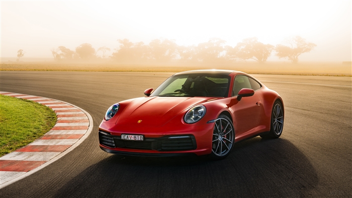 Red 2019 Porsche 911 Carrera S on a race track