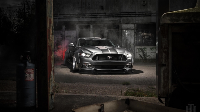 Custom Ford Mustang in an abandoned industrial area