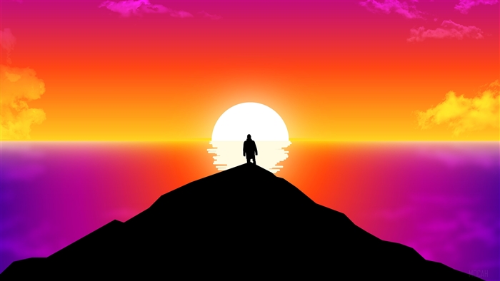 Silhouette of a person on a mountain overlooking the ocean at sunset