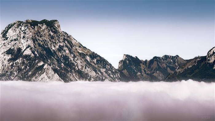 Mountains above clouds in winter 4K