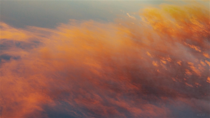 Orange and gray clouds at sunset 4K
