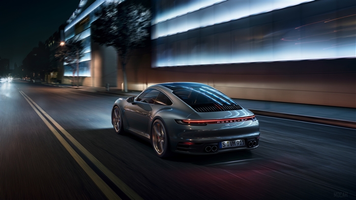 Porsche 911 driving at night