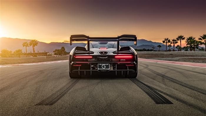McLaren Senna GTR on a racetrack at sunset
