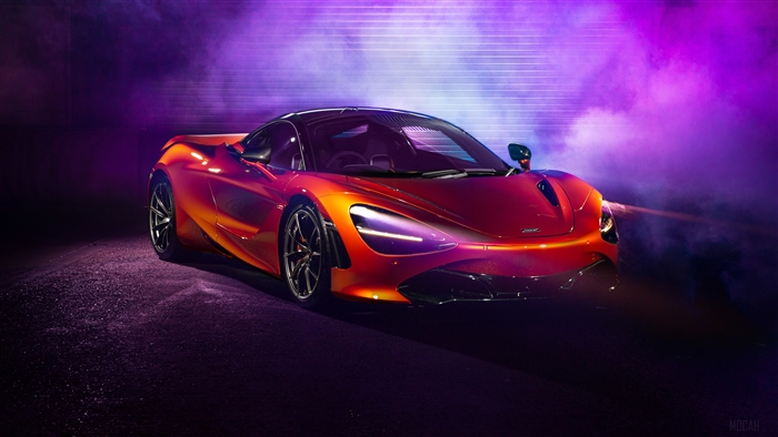 Red McLaren 720S sports car in purple smoke