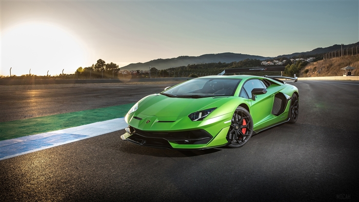 Green Lamborghini Aventador SVJ on a Racetrack