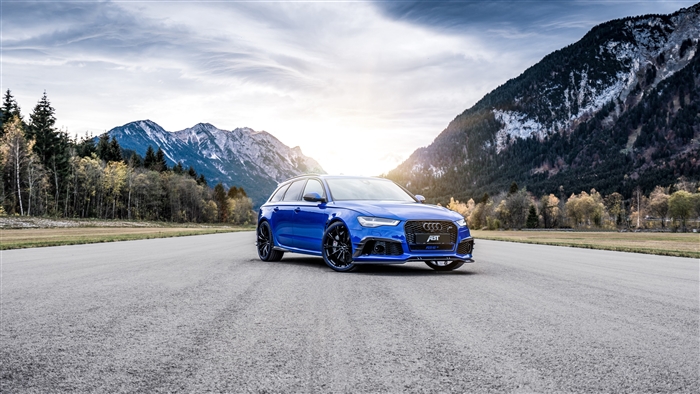 Blue Audi ABT RS 6 Avant in mountains